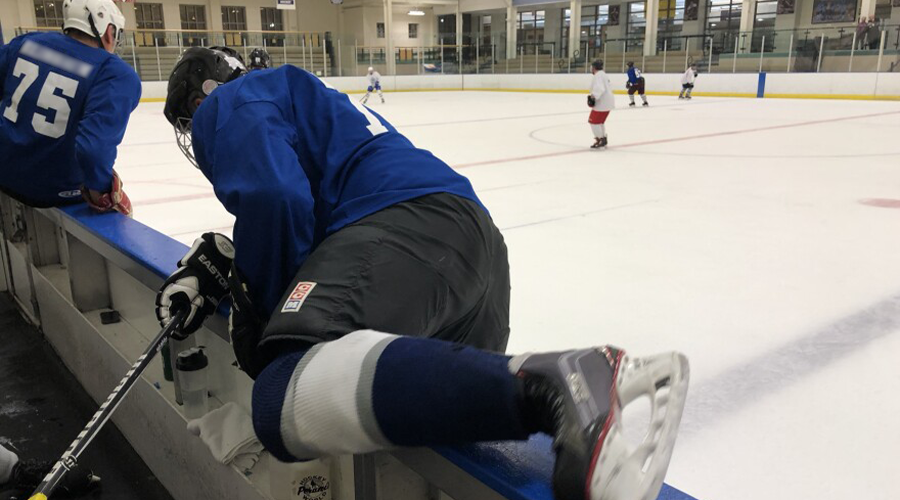 Ice Hockey Player Changing Shifts. Image Credit to Mark Arehart of WKSU.